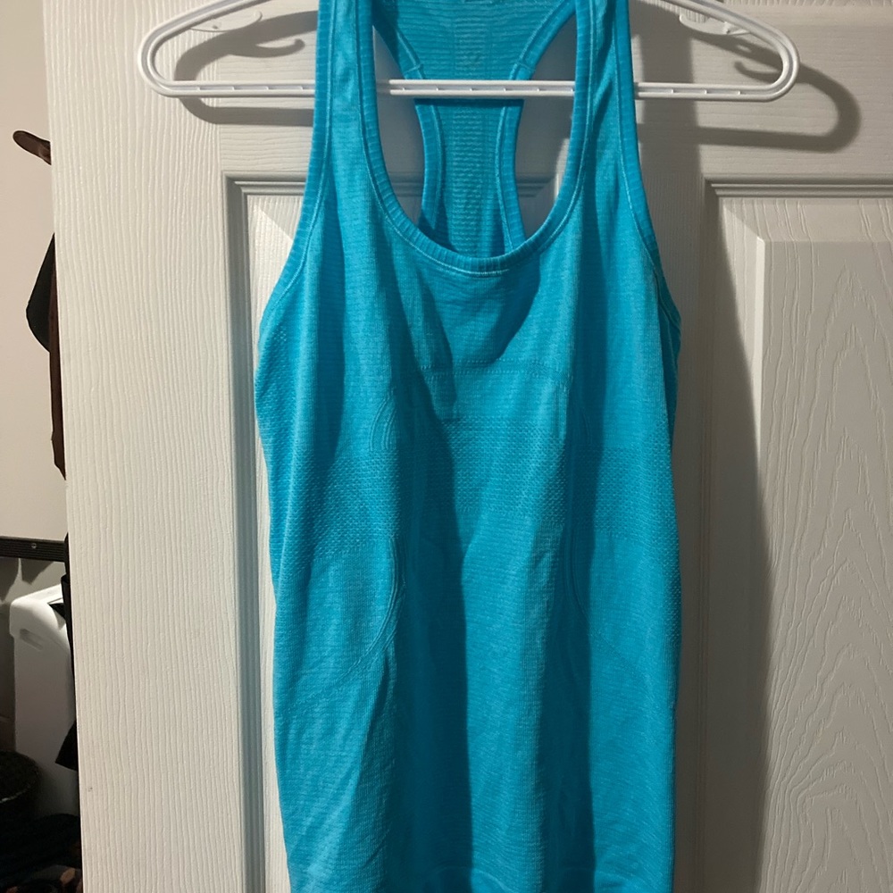 Lululemon - blue workout tank top - no size (guessed + could maybe fit a L)